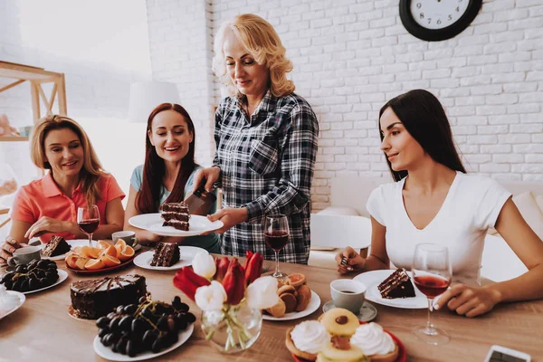 Cake for all Girl. Happiness and Spring Time. Women Eat Cake and Drinking Wine. Lady with Family. Face for Family. Flower and Happy Girl. Breakfast with Family. Holiday and Happy Family. Wine and Girl