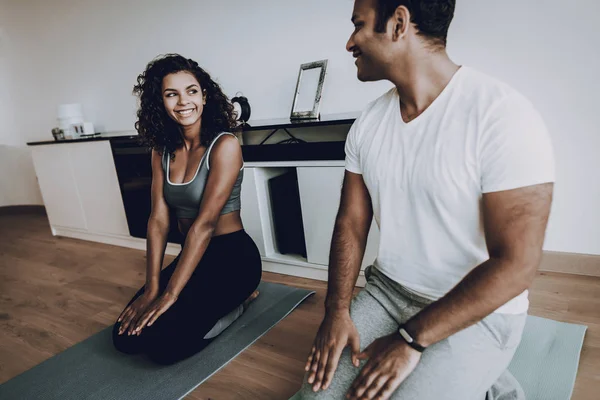 Afro American Couple. Morning Exercises Concept. Gym Carpets. Work Out Together. Healthy Lifestyle. Shape Sportswear. Attractive Athlete. Physical Healthcare. Help Each Other. Home Fitness.