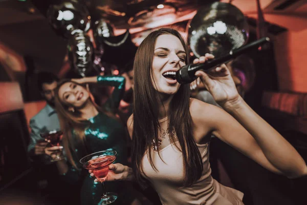 stock image Club. Young People Sing Songs. Great Mood. Karaoke Club. Celebration. Holidays Concept. Dancing People. Smiling Girl. Bar Dancing with Friends. Handsome Men. Beautiful Girls. Have Fun.