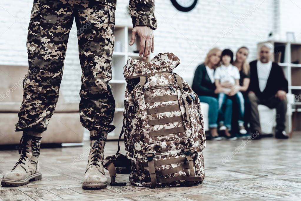 A Man Goes To Military Service. Saying Goodbye. Leaving To Army. Farewell With Family. Camouflage Uniform. Parent Hanging. Feelings Showing. Guard Of Peace. Patriotic Decision. Soldier Emotion.