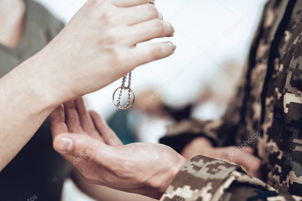 A Man Goes To Military Service. Saying Goodbye. Leaving To Army. Farewell With Family. Camouflage Uniform. Wife Hanging. Feelings Showing. Guard Of Peace. Patriotic Decision. Lucky Talisman.