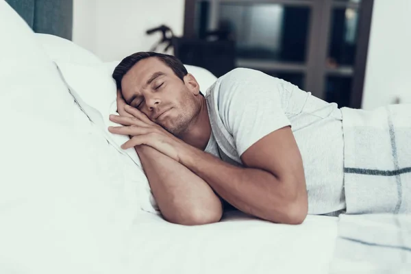 Person Sleeps Alarm Bed White Linens Handsome Young Man Lying — Stock Photo, Image