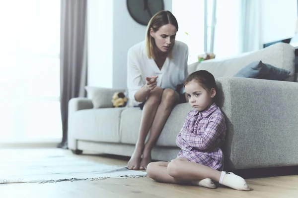Upset Girl Sitting Floor While Mother Shouting Little Pretty Child — Stock Photo, Image