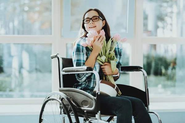 Person in Wheelchair. Woman in Wheelchair. Disabled Hall Airport. Room with Panoramic View. White Interior. Limited Opportunities. Woman Disabled. Loving Disabled. People with Limited Opportunities.