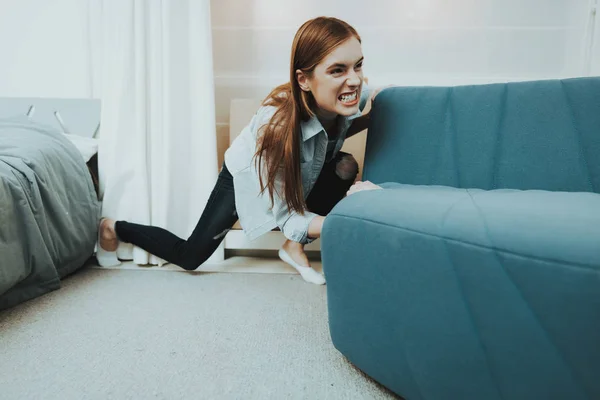Young Woman Moves Sofa New Apartment Reshuffle Room Concept Domestic — Stock Photo, Image