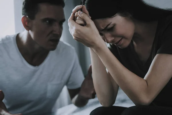 Angry Husband Yells Wife Quarrel Crying Woman Holds Head Hands — Stock Photo, Image