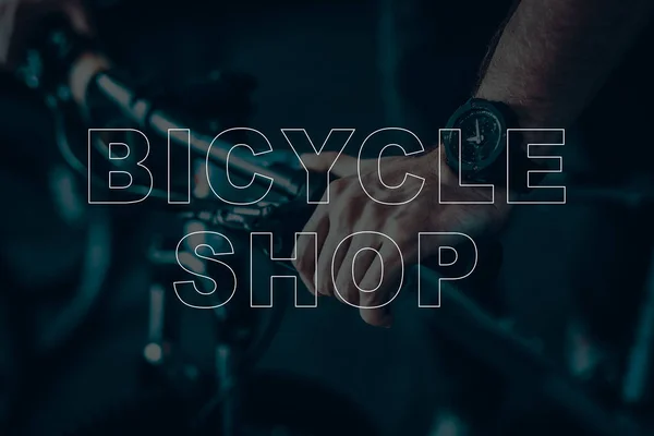 Bicycle Shop. Man Riding on Bicycle. Guy Checks the Bike. Hands of Man on the Brakes of the Bike. Salesman Hands Closeup. Clock of Man\'s Hand. Modern Bicycle. Man Sales the Bicycles.