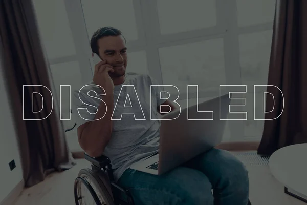 Disabled Man Wheelchair Man Sits Front Window Man Using Laptop — Stock Photo, Image