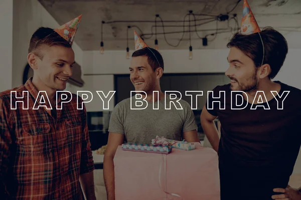 Spend Time Together. Birthday Boy. Giftbox. Happy Birthday. Present. Birthday Hat. Prepar Party. Guys. Sit on Couch. Best Friend Forever. Happy Together. Celebration. Having Fun. Cheerful. Surprise.