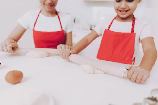 Good Work for Young Girl and Beautiful Mom. Girl Bake a Cake with Mom for Breakfast. Happy Time with Mom, Work with Mom in the Kitchen. Fun with Mom in the Kitchen. Woman and Girl. Cook iwith Mom.