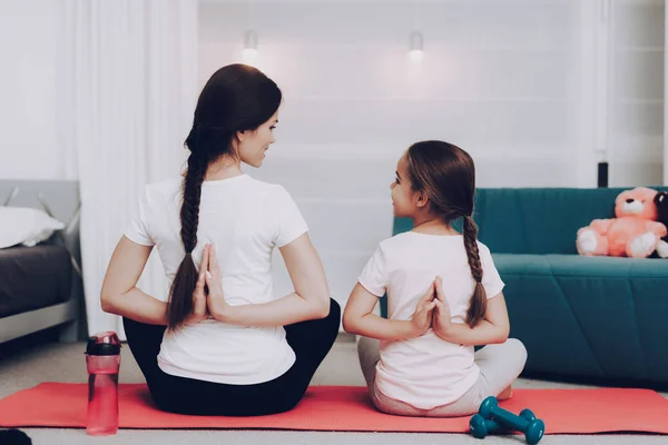 Smiling Little Girl Doing Yoga Pose Home Adorable Happy Child Stock Photo  by ©vadimphoto1@gmail.com 211089754