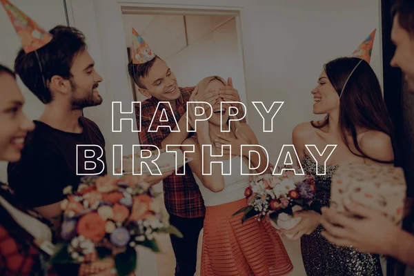 Happy Birthday Celebration. Man Leads Woman to Surprise Party. Guy Closed Girl\'s Eyes by Hands. Birthday Girl Smiles. Friends Prepared Surprise. Guy in Birthday Hat. Best Friends Happy Together.