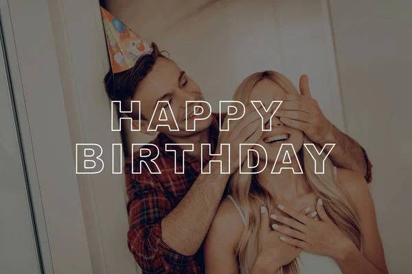 Guy Closed Girl\'s Eyes by Hands. Birthday Girl Smiles. Man Leads Woman to Surprise Party. Friends Prepared Surprise. Happy Birthday Celebration. Guy in Birthday Hat. Best Friends Happy Together.