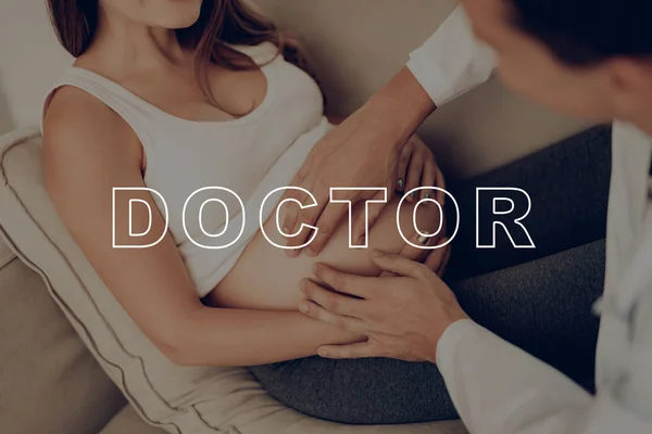 Doctor Probed Stomach. Medical Consultation. Preggers Care for Child. Belly Girl Anticipation Pregnancy. Belly Woman Lies on Sofa. Pregnant Girl Smiles. Daily Life Expectant Mother.