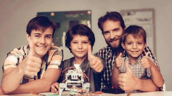 Bearded Father Sons Constructing Robot Home Young Boy Shirt Indoor — Stock Photo, Image