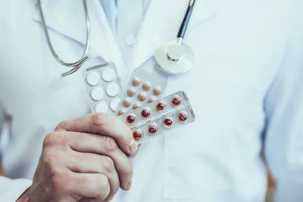 Pharmacist Holding Different Packages Pills Hand Adult Male Pharmacist Man — Stock Photo, Image