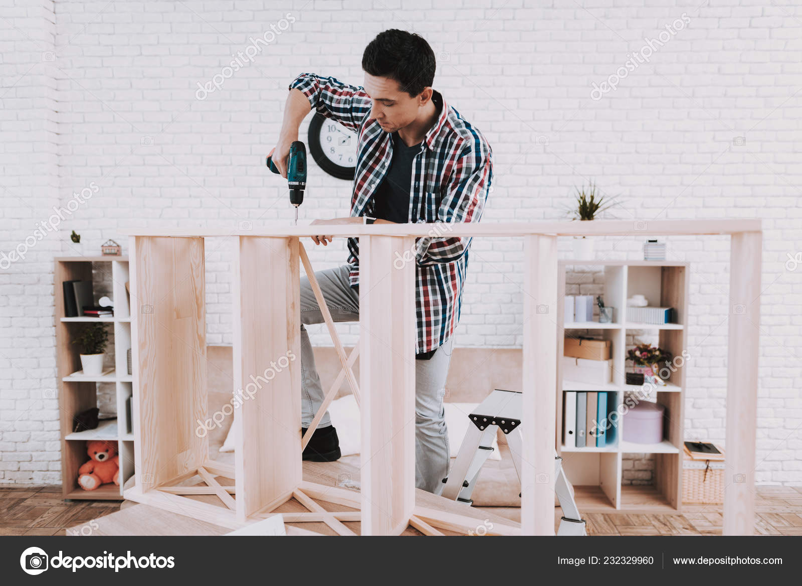 Young Man Assembling Wooden Bookshelf Home Wooden Bookcase