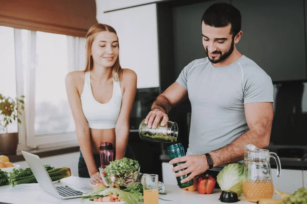 A Couple Is Preparing A Salad For A Breakfast. Vegetables Cocktail. Healthy Lifestyle Concept. Cooking Together. Sporty Athele. Young And Beautiful. Fresh Nutrition. Holiday Leisure.