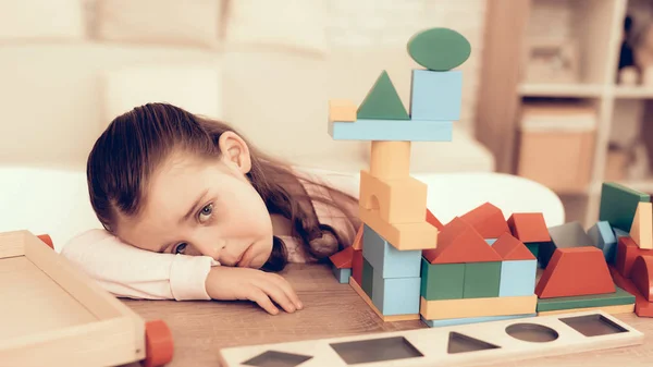 Sad Little Girl Playing with Kids Cubes at Home. — Stock Photo, Image