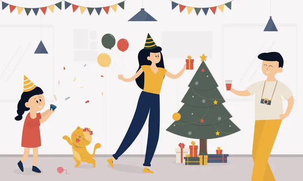 Aile tatilde evde oturma odasında kutlama yapar, anne hediye kutusu ve balon taşır, baba kameraya içki taşır, Noel ağacı ve hediye kutusu süslenir, bir kedi kızla oynar..