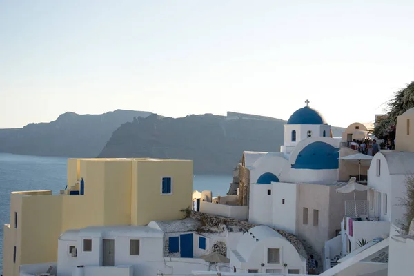 Blue dome church in Oia village, Santorini island, Greece.