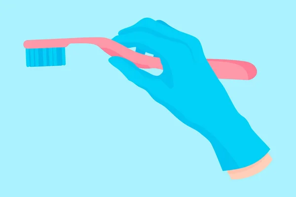 Main vectorielle de dessin animé d'un dentiste dans un gant bleu qui tient un instrument dentaire : brosse à dents manuelle pour les soins buccodentaires. — Image vectorielle
