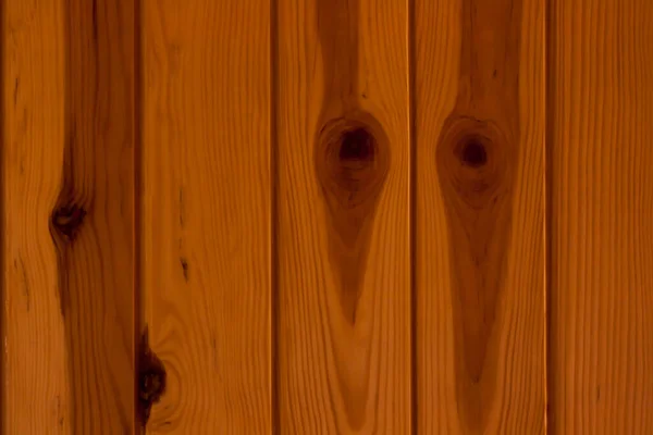 Lacquered pine texture, wood with knots, background