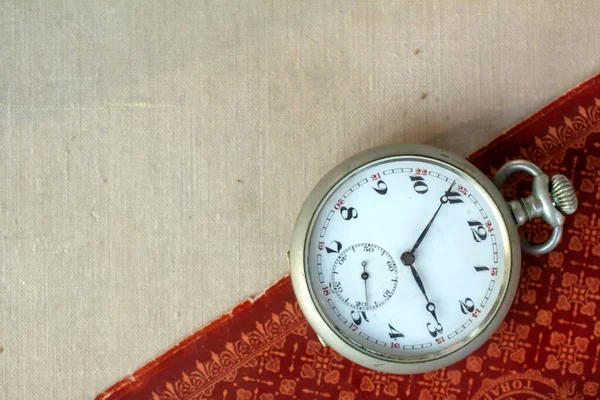 Silver pocket watch. Victorian objects.