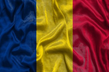 Kumaş desenli Çad ulusal bayrağı. Chad 'in bayrağı rüzgarda sallanıyor. 3B illüstrasyon