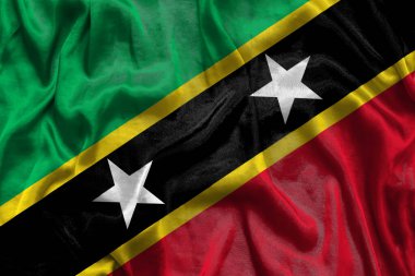 Saint Kitts ve Nevis ulusal bayrak arkaplanı kumaş dokusuyla. Aziz Christopher Federasyonu bayrağı ve Nevis rüzgarda sallanıyor. 3B illüstrasyon