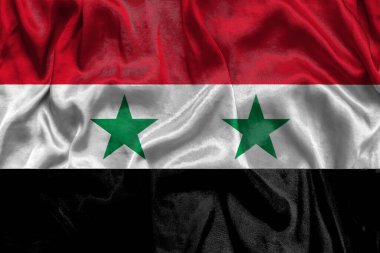 Kumaş desenli Suriye ulusal bayrağı. Suriye bayrağı rüzgarda sallanıyor. 3B illüstrasyon