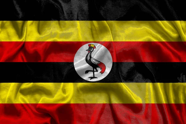 Bandeira nacional Uganda fundo com textura de tecido. Bandeira de Uganda acenando ao vento. Ilustração 3D — Fotografia de Stock