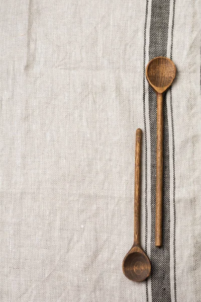 Texture Gray Fabric Brown Stripe Two Wooden Old Vintage Spoons — Stock Photo, Image
