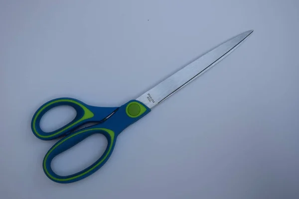 Scissors Made Stainless Steel Blue Green Handles White Background — Stock Photo, Image