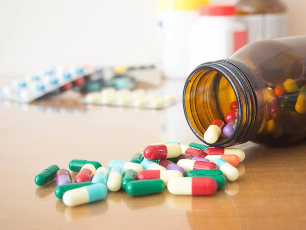 Colorful Medicine Capsules Spilling Out Brown Glass Bottle Pharmaceutical Medicament — Stock Photo, Image