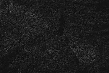 Siyah zemin döşemesi iç ve dış taş duvar. Tasarım için boşluk