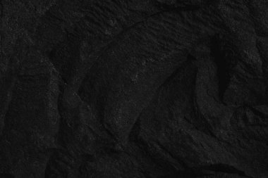 Siyah zemin döşemesi iç ve dış taş duvar. Tasarım için boşluk