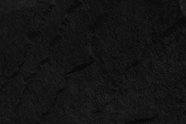 Siyah zemin döşemesi iç ve dış taş duvar. Tasarım için boşluk