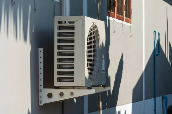 Air Compressors Installed on the side of the house.