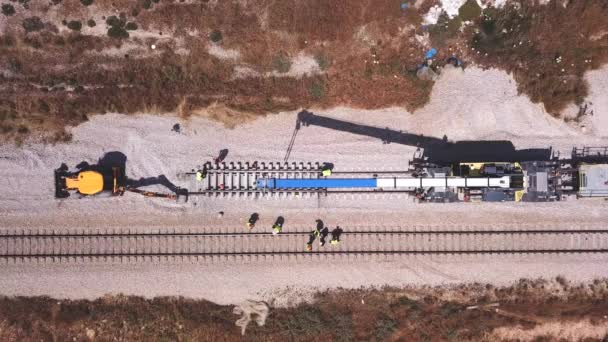 Railroad workers repairing a broken track. Repairing railway. Rail tracks maintenance process. — Stock Video