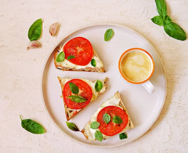 Open Hot Sandwiches Mozzarella Cheese Fresh Tomato Basil White Plate — Stock Photo, Image