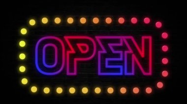 Tuğladan siyah duvarlı açık renkli neon tabela