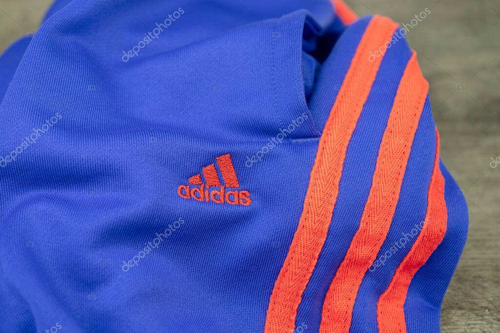 Adidas brand sweatpants on inside label, sportswear, casual clothes. Kiev, Ukraine - August, 2020