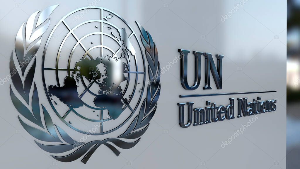 Metal United Nation emblem on a building facade, UN logo