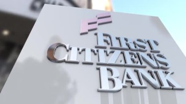 Metal First Vatandaşları Bankasının aynalı bir yüzey üzerindeki amblemi. 