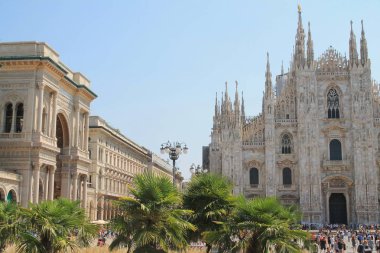 The amazing Milan Cathedral, Duomo di Milano, the largest Gothic cathedral in the world and Vittorio Emanuele gallery in Square Piazza Duomo, Italy clipart