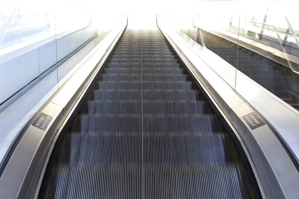 Escalera mecánica con desenfoque de movimiento Fotos De Stock