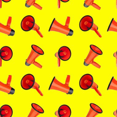 Sarı zemin üzerinde kusursuz turuncu megafon deseni izole edilmiş yakın plan, hoparlör tasarımı, hoparlörler duvar kağıdı, anons veya reklam sembolü, medya veya iletişim işareti