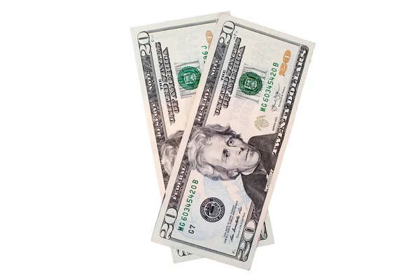 Beyaz arka planda 20 dolarlık banknotlar. Yakından izole edilmiş. 20 Amerikan doları hayranı.