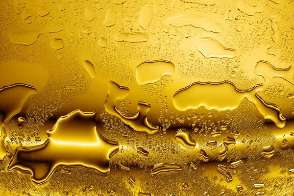 Water Drops Golden Glass Background Close Liquid Gold Droplets Texture — Stock Photo, Image